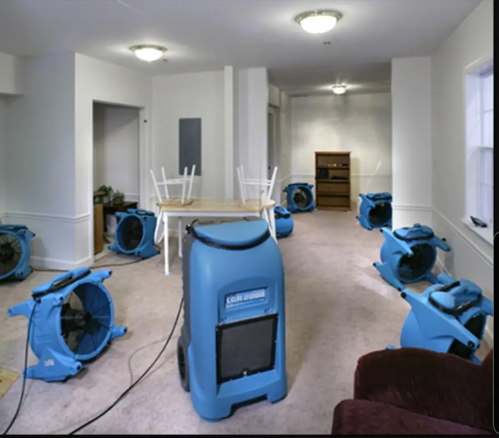 Air movers and dehumidifier setup for Water Damage Restoration in Wayne